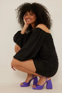 Robe à Armatures Et Ourlet Oblique